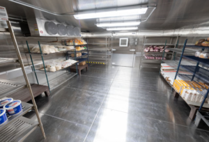 why is my walk-in cooler freezing up